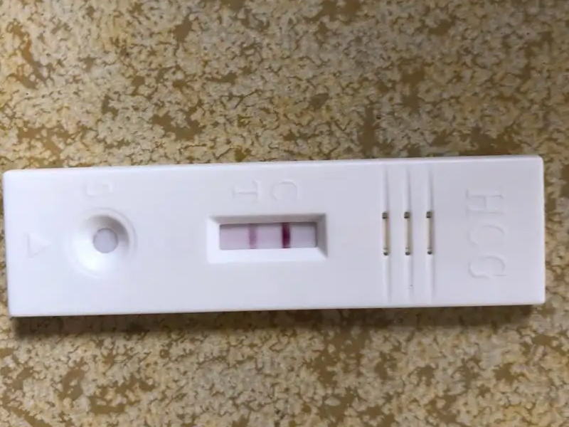 验孕棒过十分钟出现个浅印